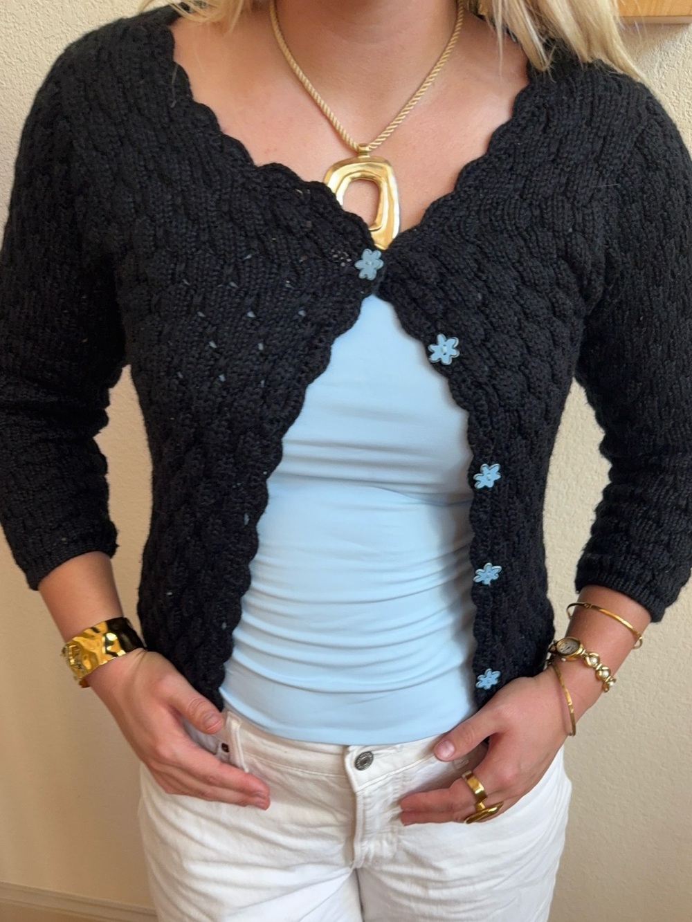 Y2K vintage Twiggy black cable knit cardigan with blue flower buttons